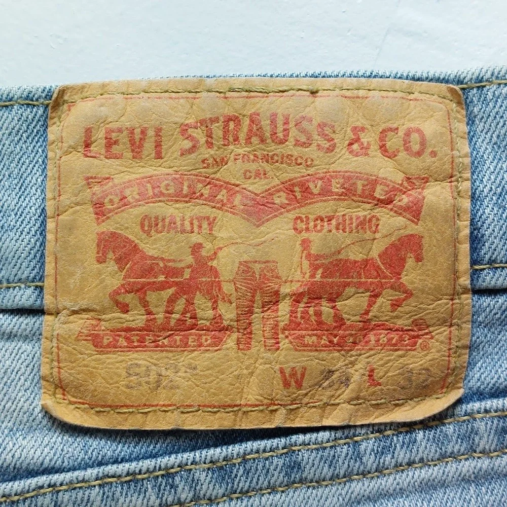 Levi's 502 Regular Taper Jeans Men's 34x32 Blue Light Wash Denim Americana